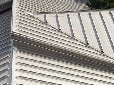 Close up of a gray metal roofing system
